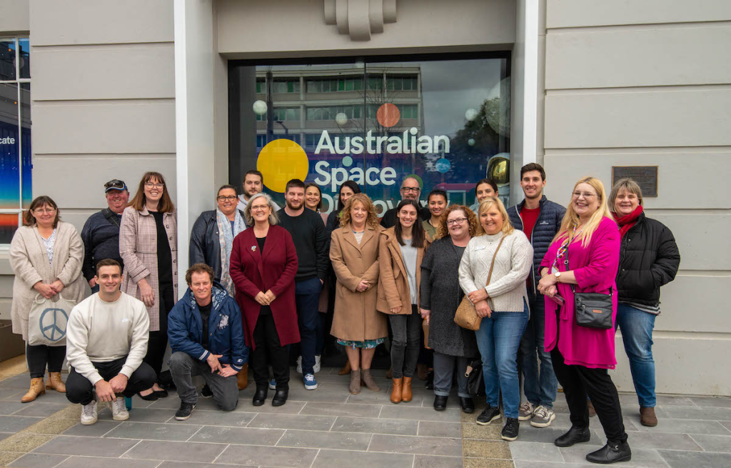 group of people in front of the Australian space agency 